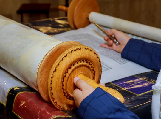 Boy Reading Torah Scroll